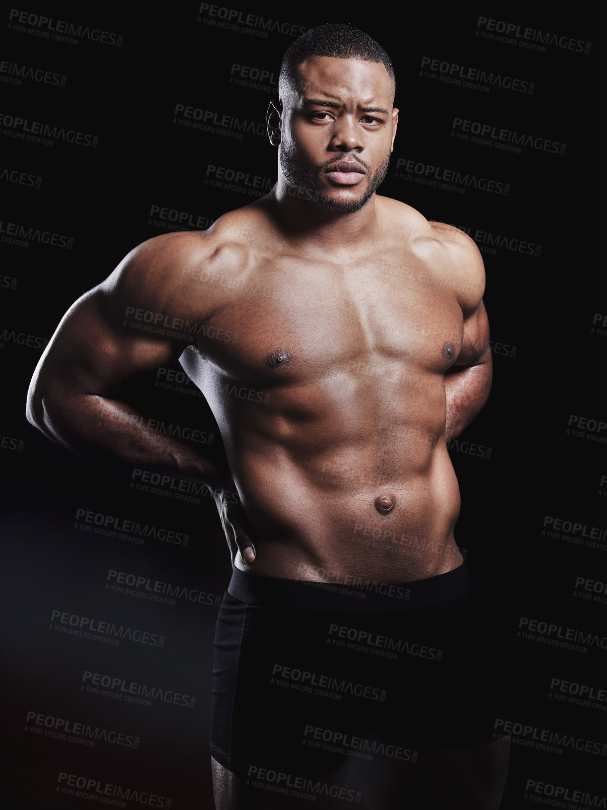 Buy stock photo Black man, portrait and abdomen in studio for exercise, strong bodybuilder or training for wellness. Male athlete, dark background or confidence for topless workout, stomach with muscle for gym sport