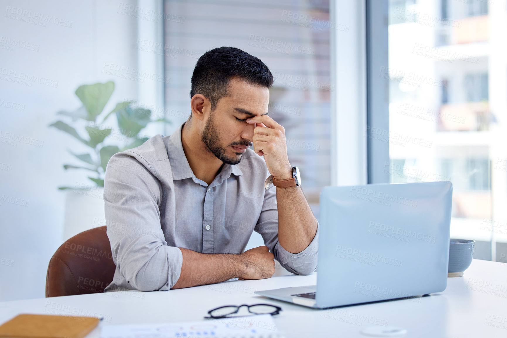 Buy stock photo Business, stress and man with a headache, laptop and overworked with health issue, professional and pain. Male person, employee or entrepreneur with a pc, burnout and migraine with fatigue or problem