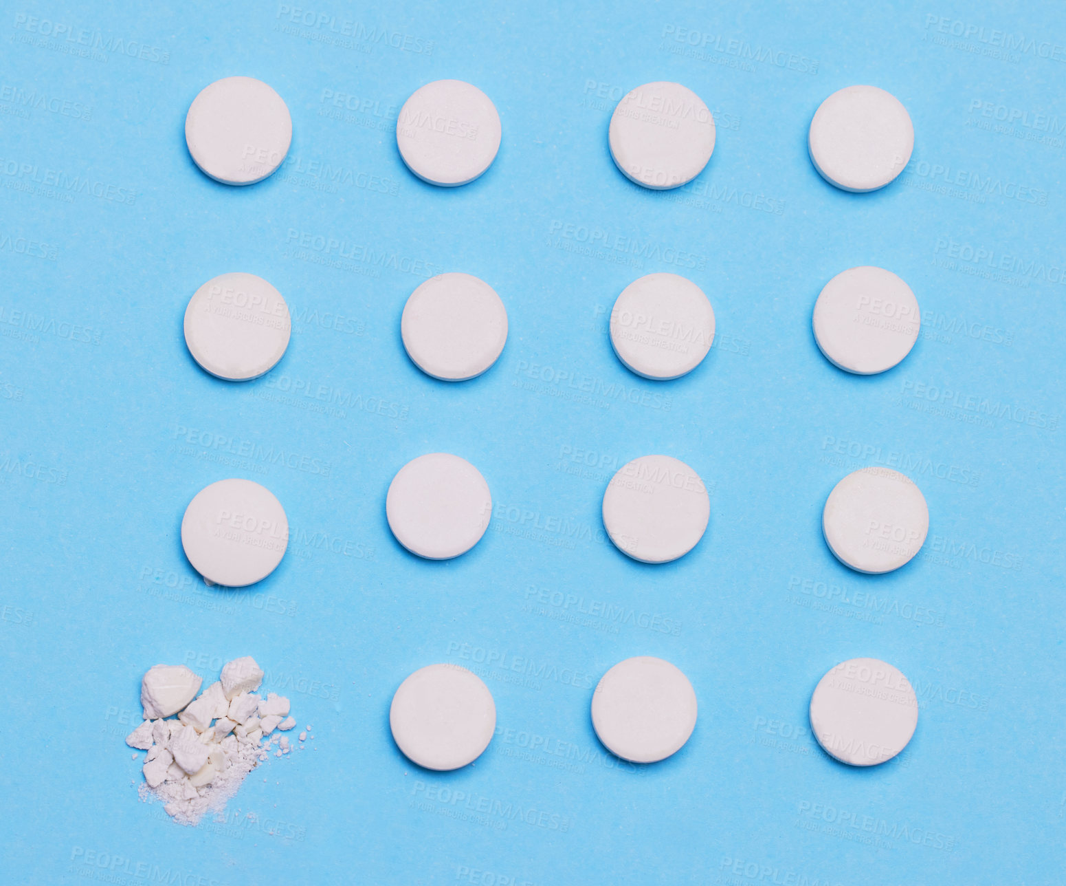 Buy stock photo Studio shot of pills against a blue background