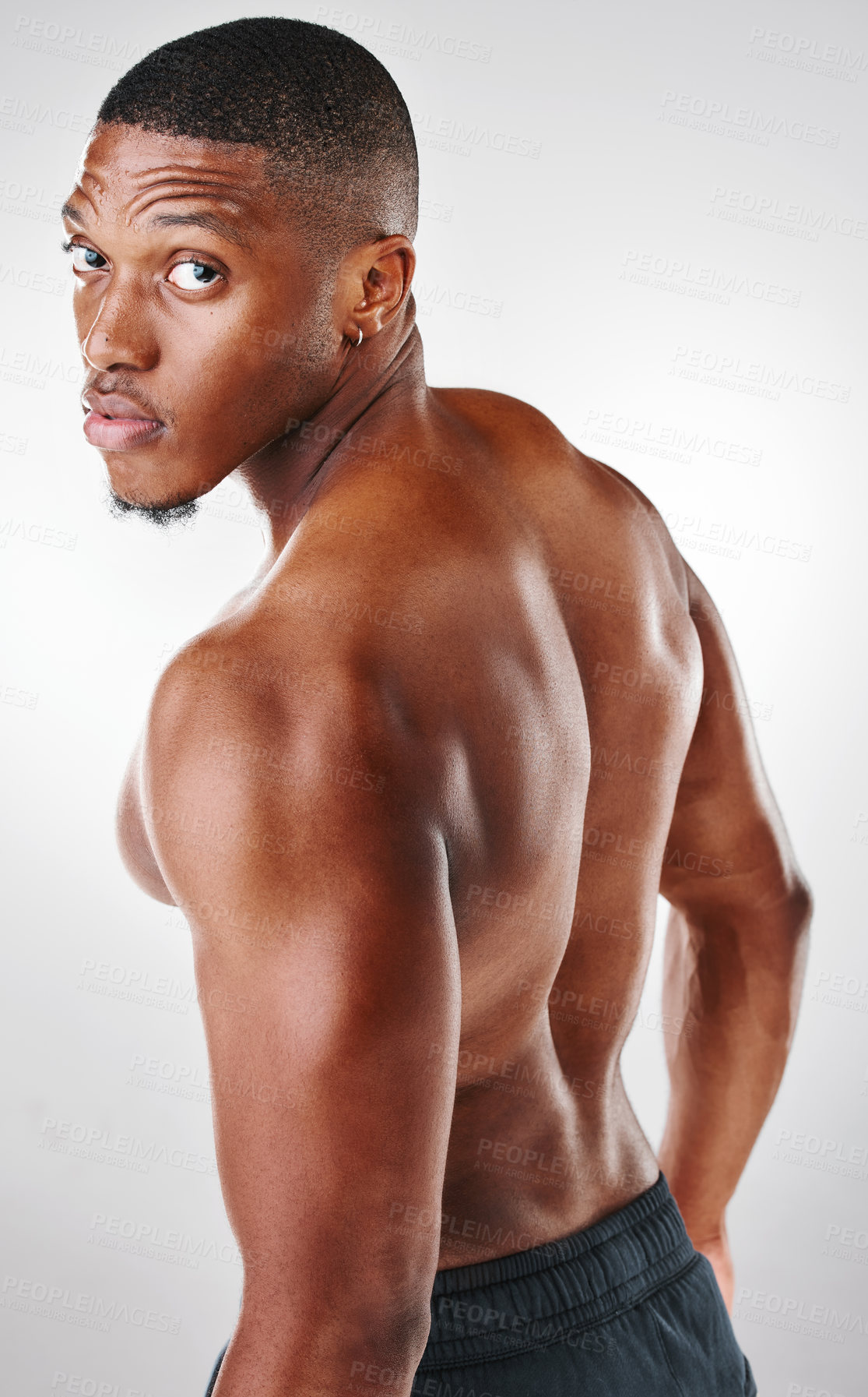 Buy stock photo Portrait, African man and back in studio for fitness, workout and results for muscles. Male athlete or bodybuilder, wellness and arms or biceps by white background for sportsman, training and pride