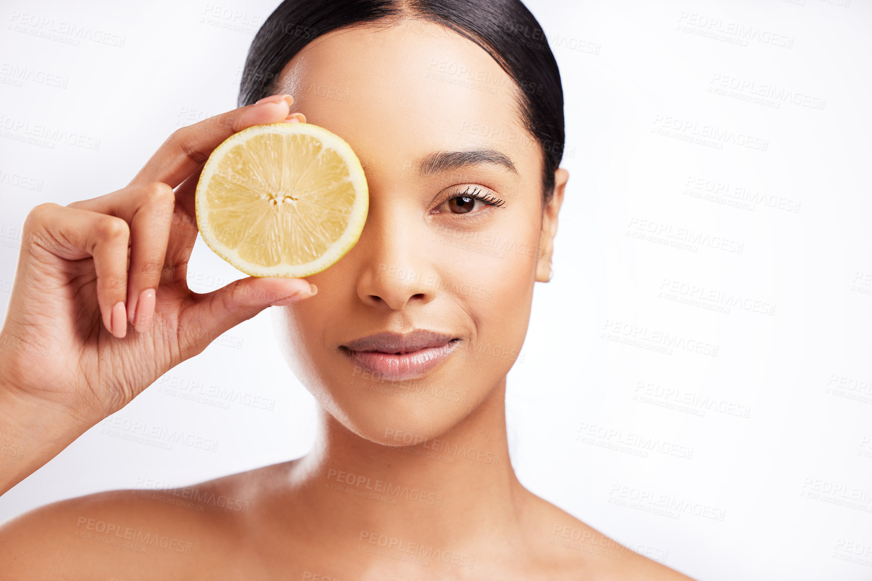 Buy stock photo Studio, portrait and woman with lemon, skincare and facial treatment with natural organic. Female model, citrus fruit and healthy skin for wellness, vitamin c and covered eye by white background