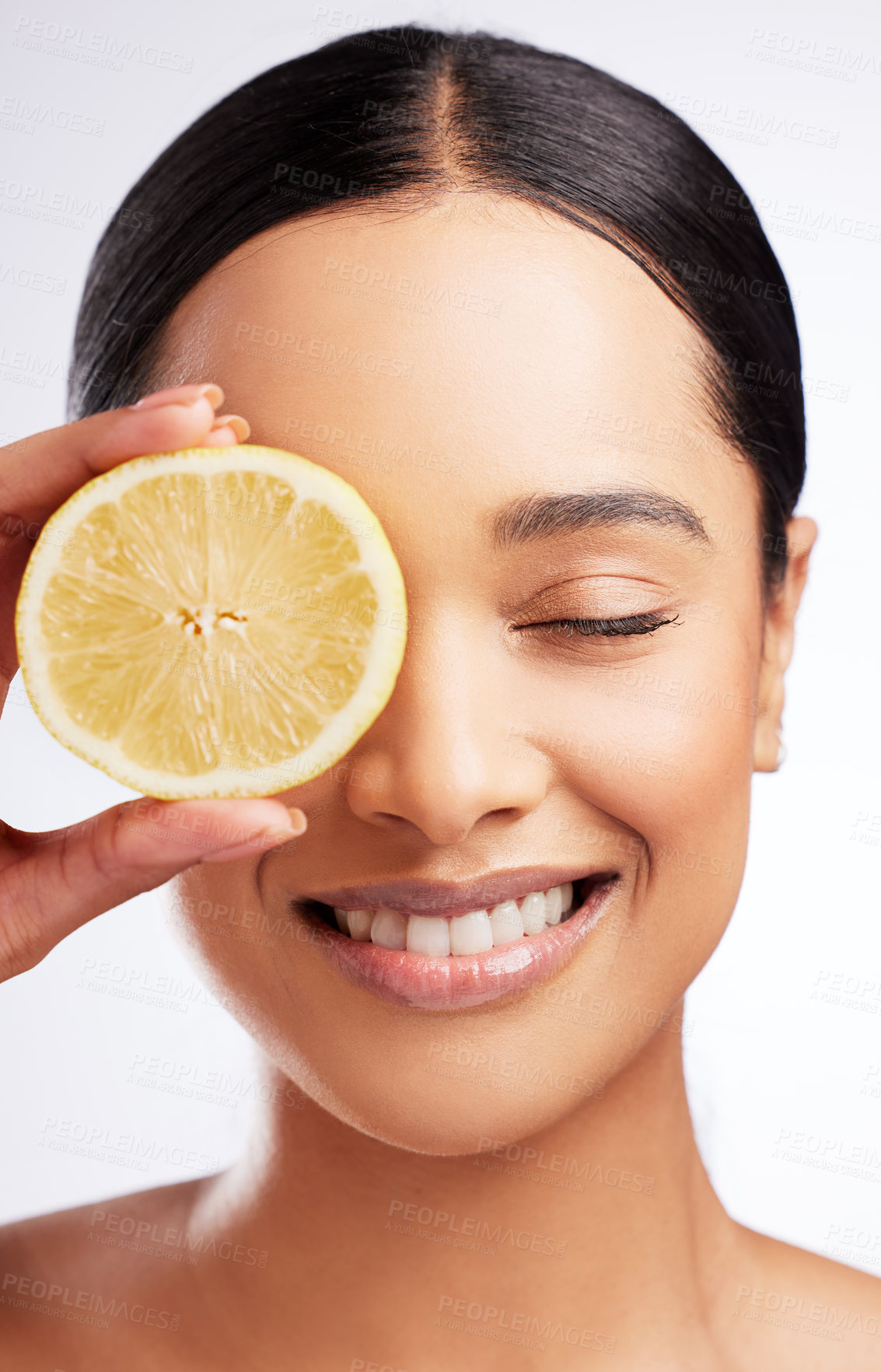 Buy stock photo Studio, relax and woman with lemon, skincare and facial treatment with natural organic. Female model, citrus fruit and healthy skin for wellness, vitamin c and covered eye by white background