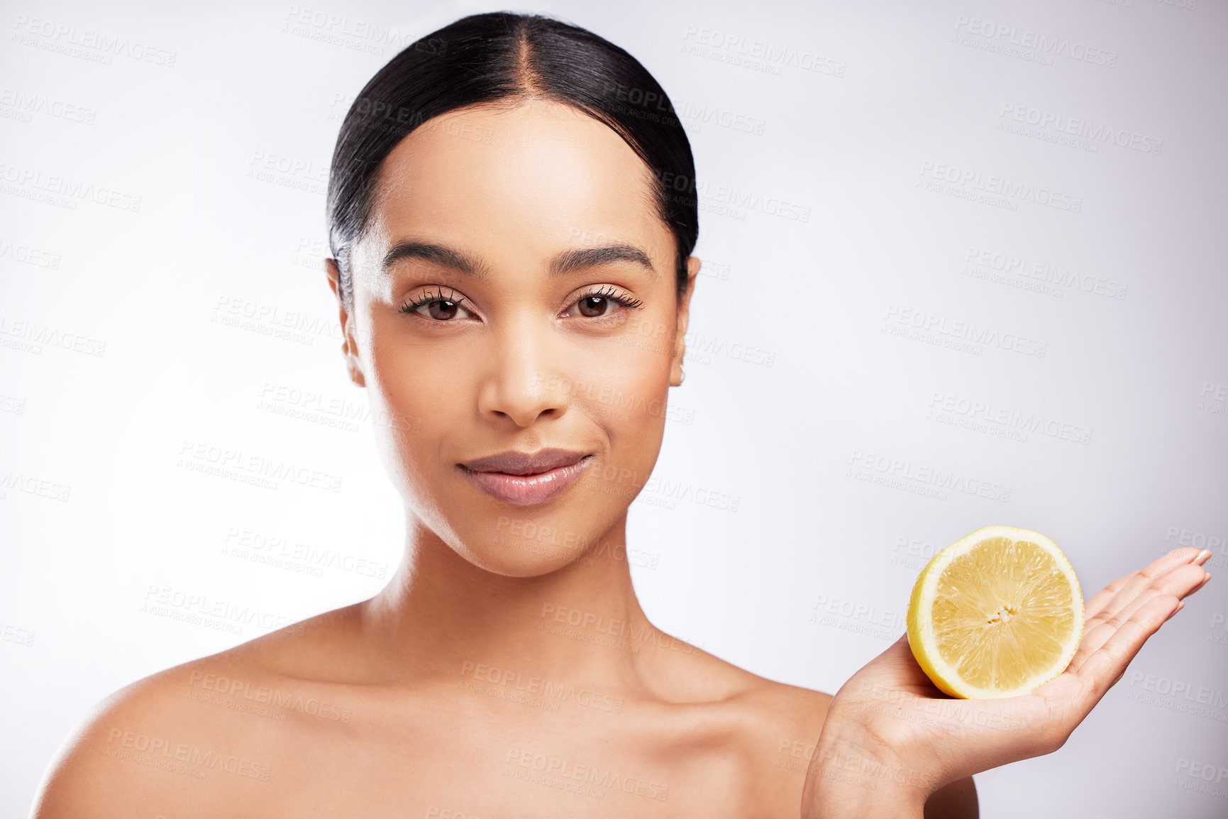 Buy stock photo African woman, studio and portrait with lemon for beauty, natural cosmetics for facial. Female person, white background or makeup with smile for sustainable skincare, detox wellness or aesthetic