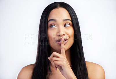 Buy stock photo Woman, quiet and secret for hair care in studio with salon aesthetic and healthy scalp for growth. Model girl, keratin shine and silence emoji with thinking for texture ideas by white background