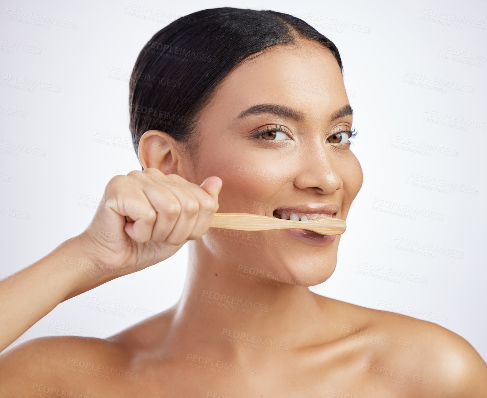 Buy stock photo Dental, portrait or woman brushing teeth in studio for wellness, fresh breath or oral care on white background. Teeth whitening, face or model with eco friendly bamboo toothbrush for mouth cleaning