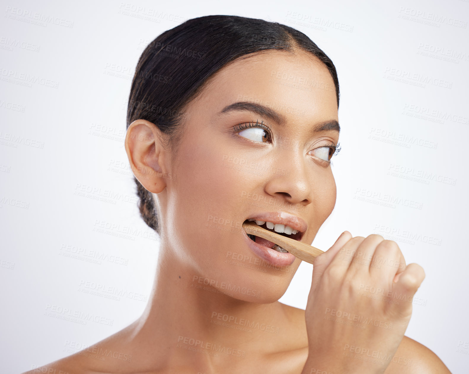 Buy stock photo Dental care, girl or brushing teeth in studio for wellness, fresh breath or oral hygiene on white background. Mouth, toothpaste or model with eco friendly bamboo toothbrush for tooth, gum or cleaning