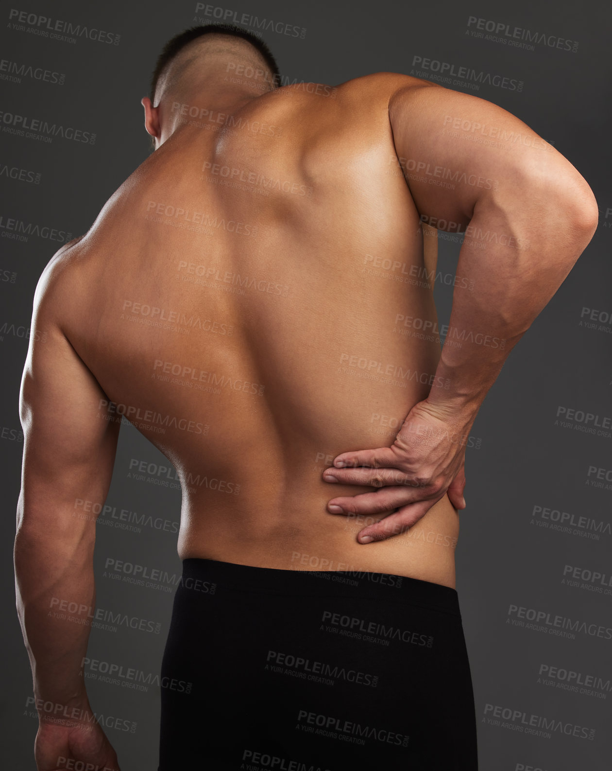 Buy stock photo Back pain, body and fitness man in studio with workout mistake, fail or muscle inflammation on black background. Sports, injury and male bodybuilder with backache, wound or anatomy risk and emergency