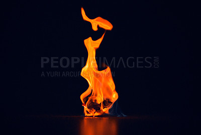 Buy stock photo Fire, small and flame on black background in nature with heat, sparks and paper for light or energy. Hot, hell and burning for bonfire, barbecue and fireplace start at night with risk or danger 