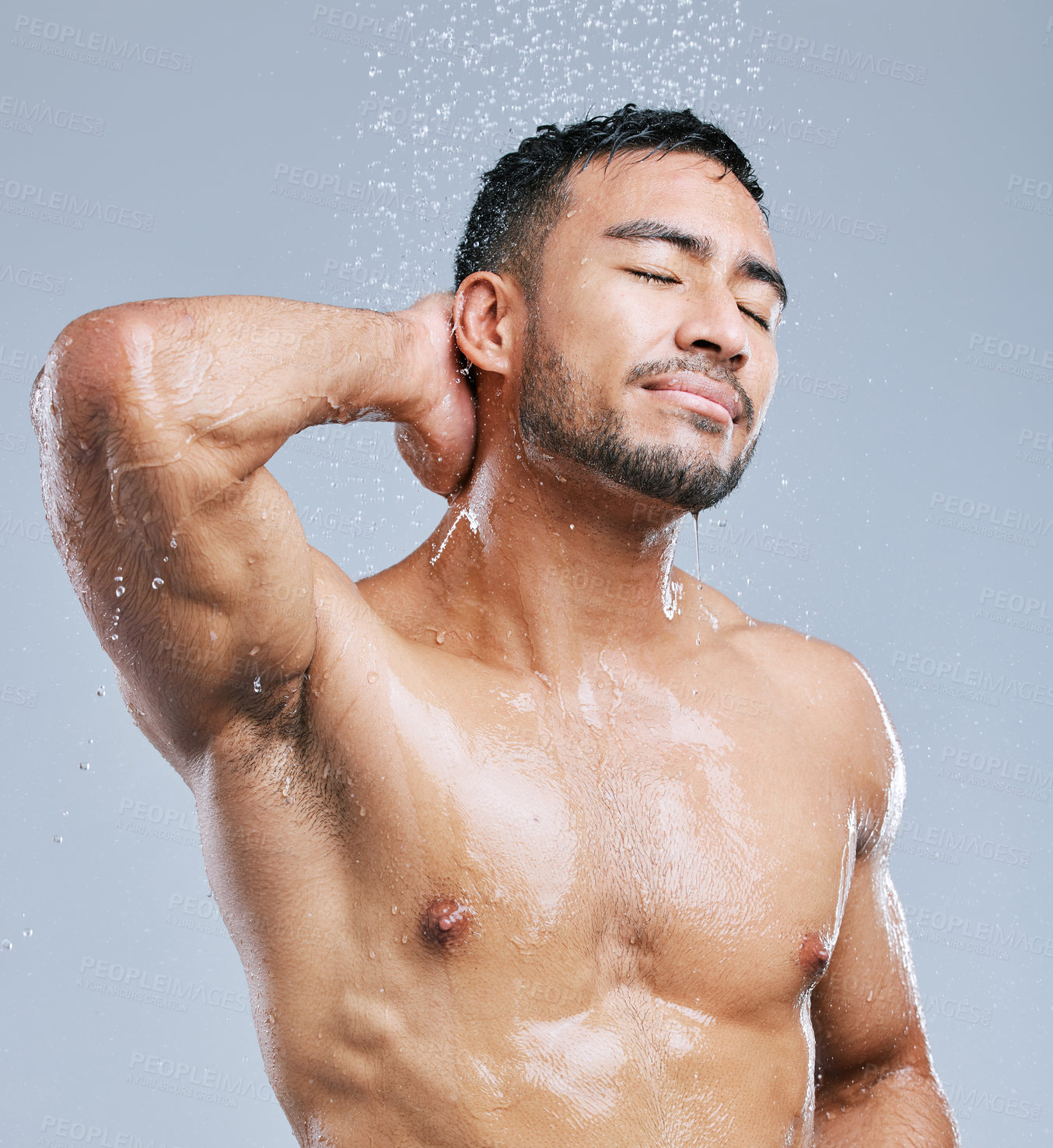 Buy stock photo Man, cleaning and water on body for shower, skincare and wash on white studio background with smile. Male model, happiness and hygiene with clear liquid for facial, wellness and self care in bathroom