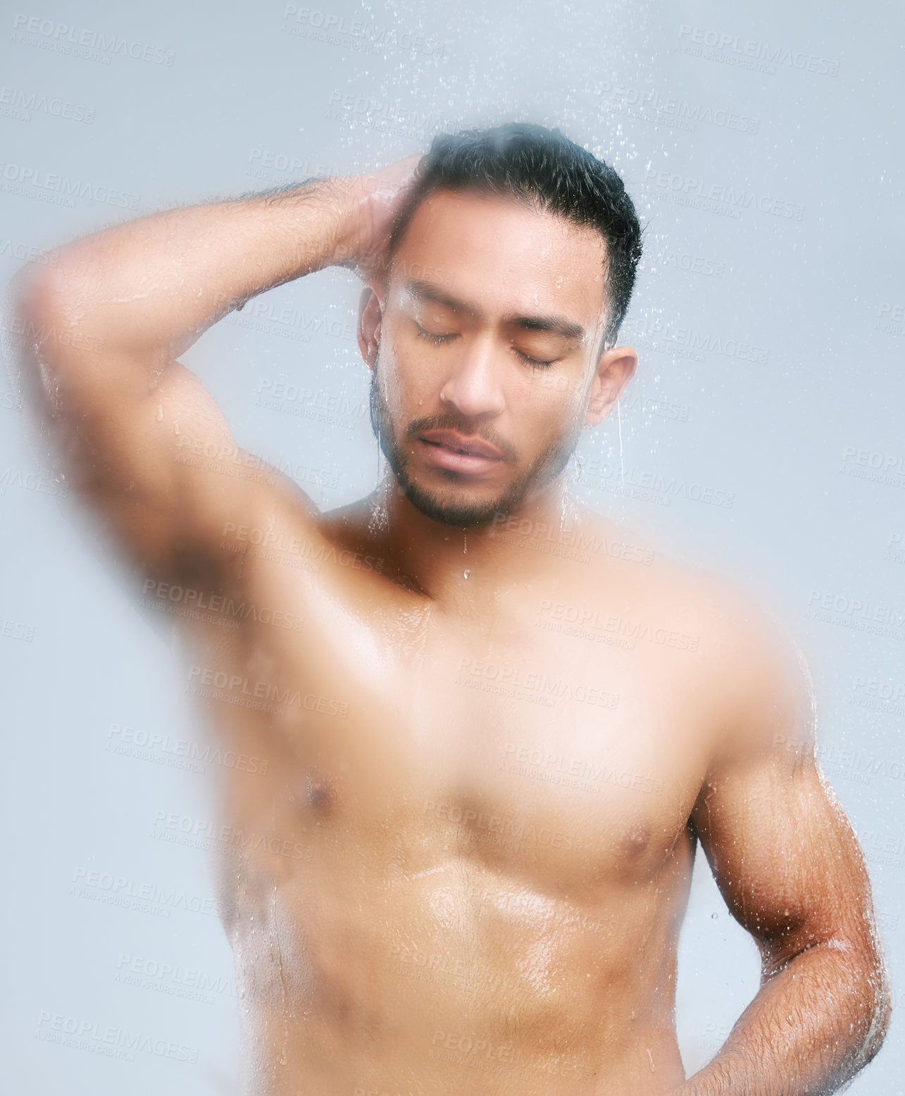 Buy stock photo Cosmetics, man and washing body for hygiene, grooming and self care or cleaning in studio grey background. Wellness, male person and water with soap showering for health treatment and dermatology