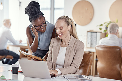 Buy stock photo Shot of two young women using headsets and laptop in a modern office