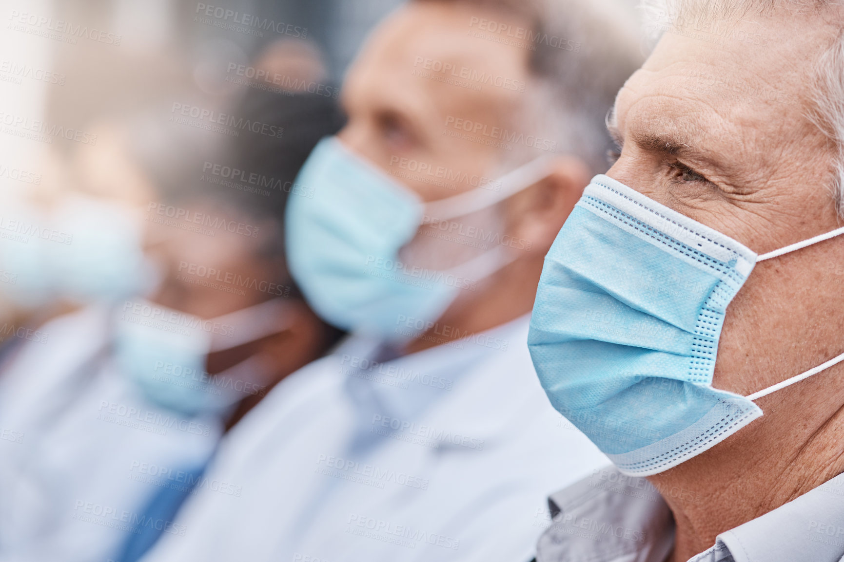 Buy stock photo Closeup shot of a group of doctors wearing masks