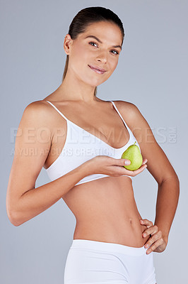 Buy stock photo Portrait, woman and pear smiling for healthy diet, fitness and nutrition in white studio background. Wellness, female person and fruit happy for organic meal, snack or vegan eating with vitamins