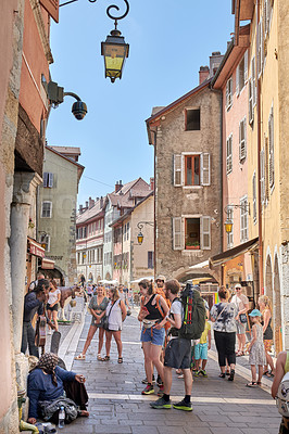 Buy stock photo Annecy, France, July, 17, 2019: Houses and street life in the famous medieval part of the city of Annecy, Department of Upper Savoy, France.Editorial: Annecy, France, July, 17, 2019: Houses and street life in the famous medieval part of the city of Annecy, Department of Upper Savoy, France.