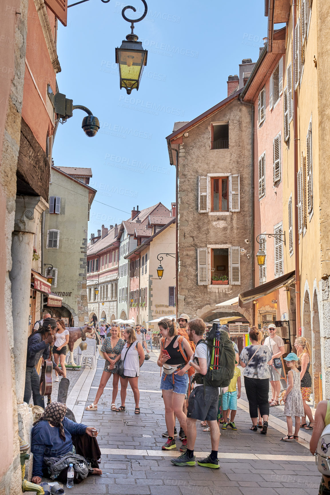 Buy stock photo Annecy, France, July, 17, 2019: Houses and street life in the famous medieval part of the city of Annecy, Department of Upper Savoy, France.Editorial: Annecy, France, July, 17, 2019: Houses and street life in the famous medieval part of the city of Annecy, Department of Upper Savoy, France.