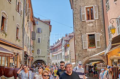 Buy stock photo Annecy, France, July, 17, 2019: Houses and street life in the famous medieval part of the city of Annecy, Department of Upper Savoy, France.Editorial: Annecy, France, July, 17, 2019: Houses and street life in the famous medieval part of the city of Annecy, Department of Upper Savoy, France.