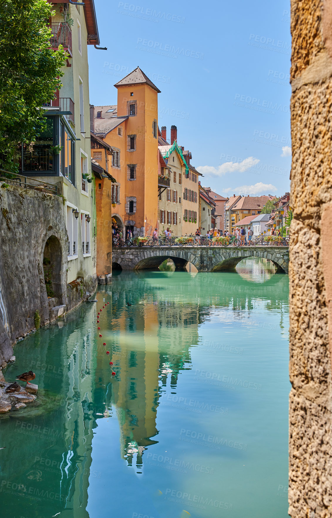 Buy stock photo Annecy, France, July, 17, 2019: Houses and street life in the famous medieval part of the city of Annecy, Department of Upper Savoy, France.Editorial: Annecy, France, July, 17, 2019: Houses and street life in the famous medieval part of the city of Annecy, Department of Upper Savoy, France.