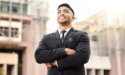 Buy stock photo Shot of a businessman with his arms crossed
