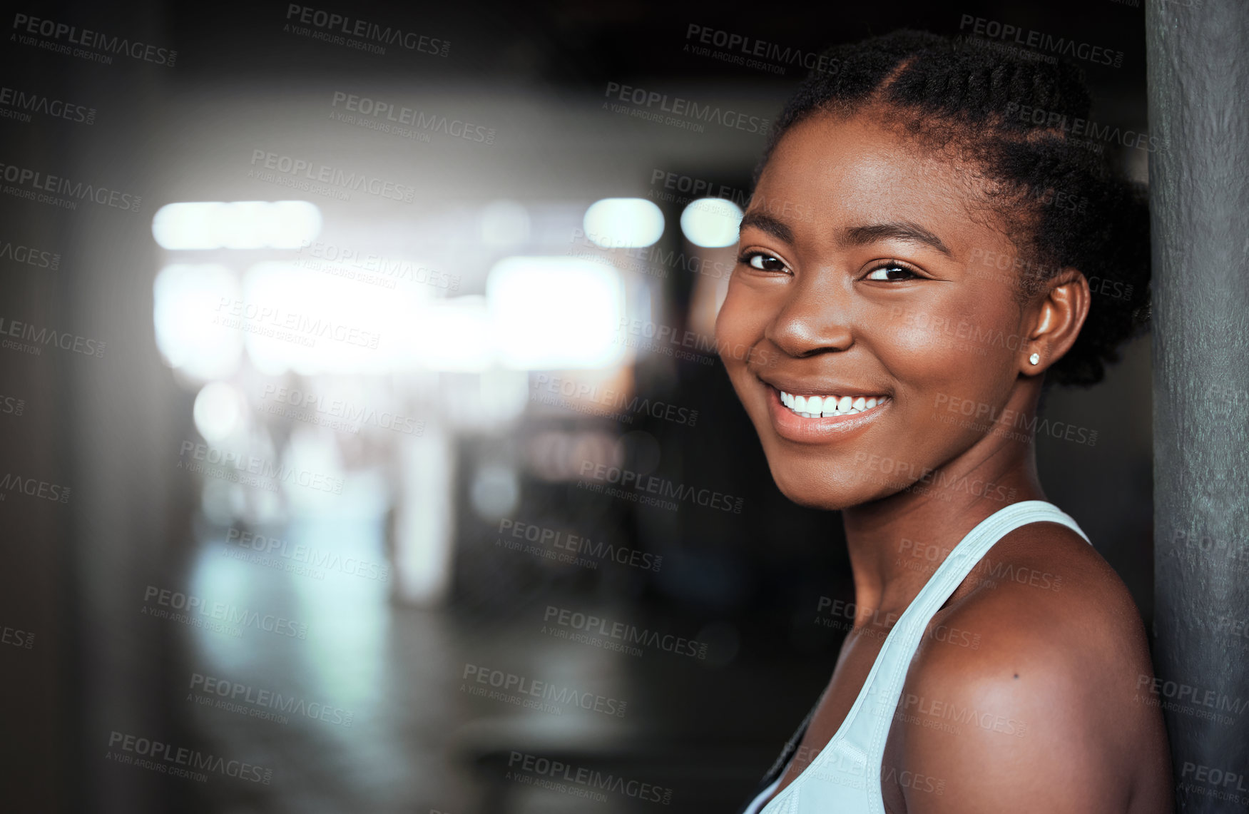 Buy stock photo Portrait of a young beautiful woman taking a break from her workout in the gym