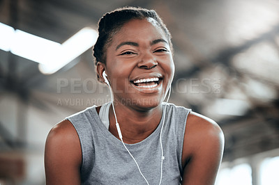 Buy stock photo Happy, portrait or black woman with headphones in gym to workout, exercise or training for wellness. Face of sports girl or healthy fitness athlete laughing with positive mindset listening to music