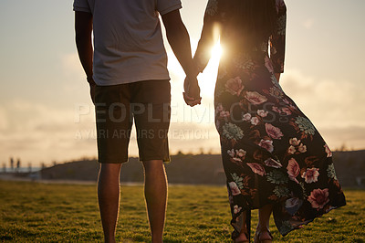 Buy stock photo Love, trust and couple holding hands in support of marriage, commitment and unity on sunset background. Man, woman and hands in solidarity of respect, empathy and care while united, hope and nature