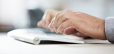 Buy stock photo Shot of a businessman typing on his keyboard