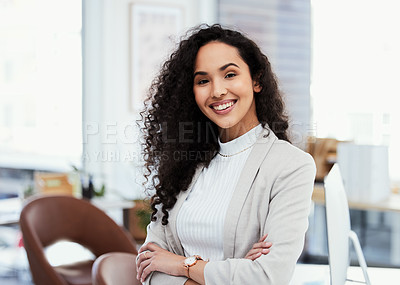 Buy stock photo Shot of a young businesswoman in her office