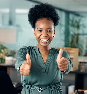 Buy stock photo Portrait of a young businesswoman showing thumbs up in an office