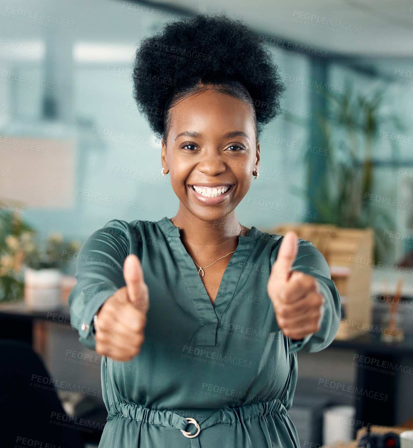 Buy stock photo Portrait of a young businesswoman showing thumbs up in an office