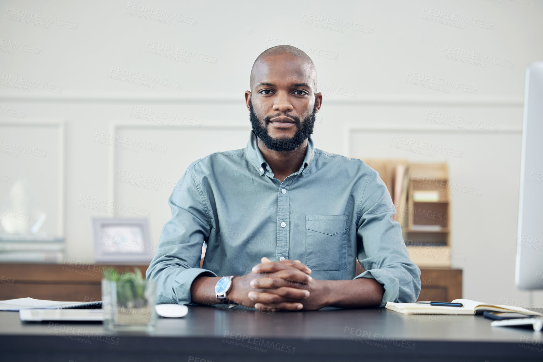 Buy stock photo Business, portrait and black man at desk in office, startup or entrepreneur focus on planning, strategy and career. Businessman, working and confident mindset, motivation and commitment to company