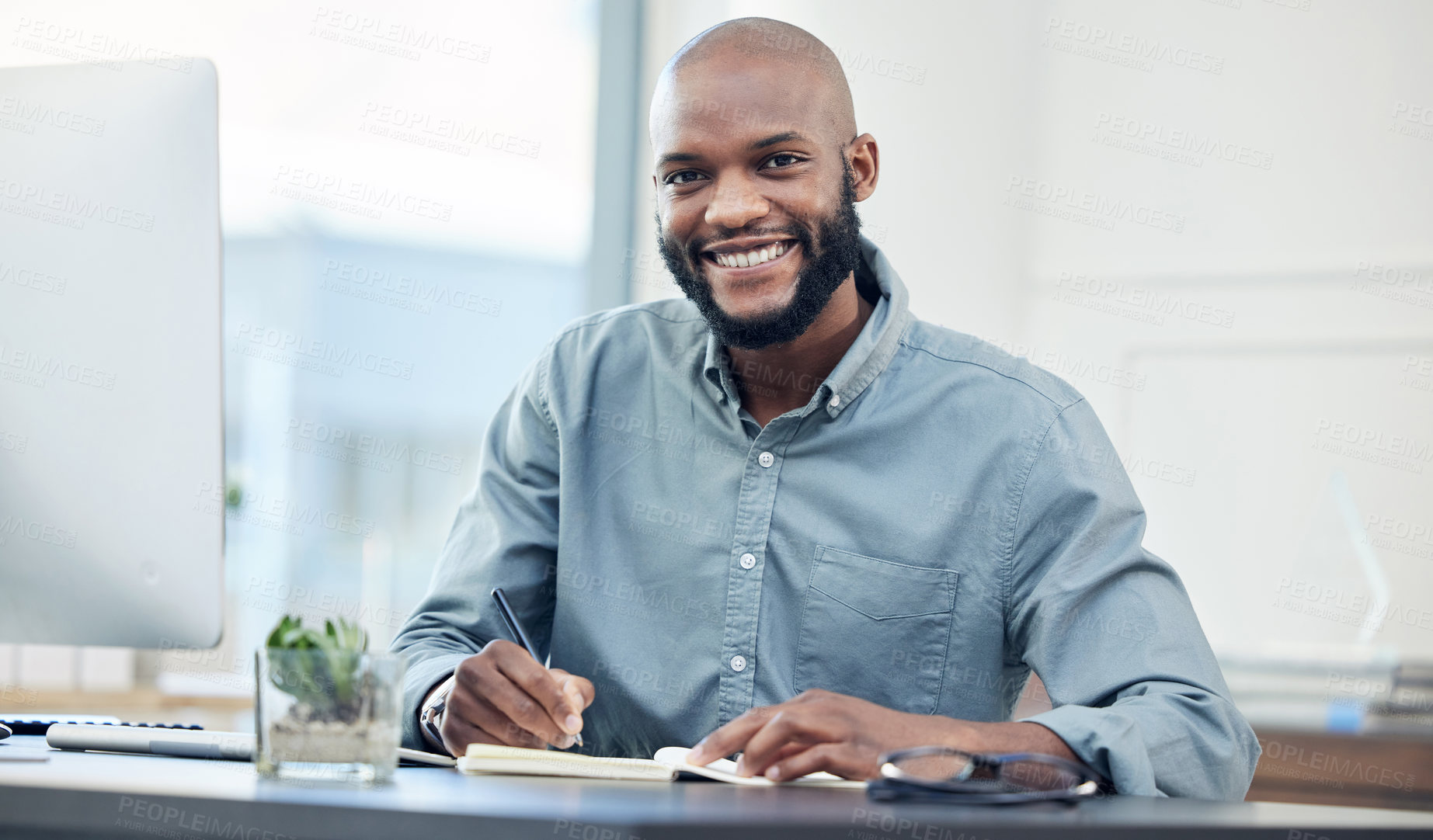 Buy stock photo Businessman, desk and notebook in portrait with smile in office with planning for creative project. Accountant, auditor and keeping records with analyst in corporate with technology for treasurer