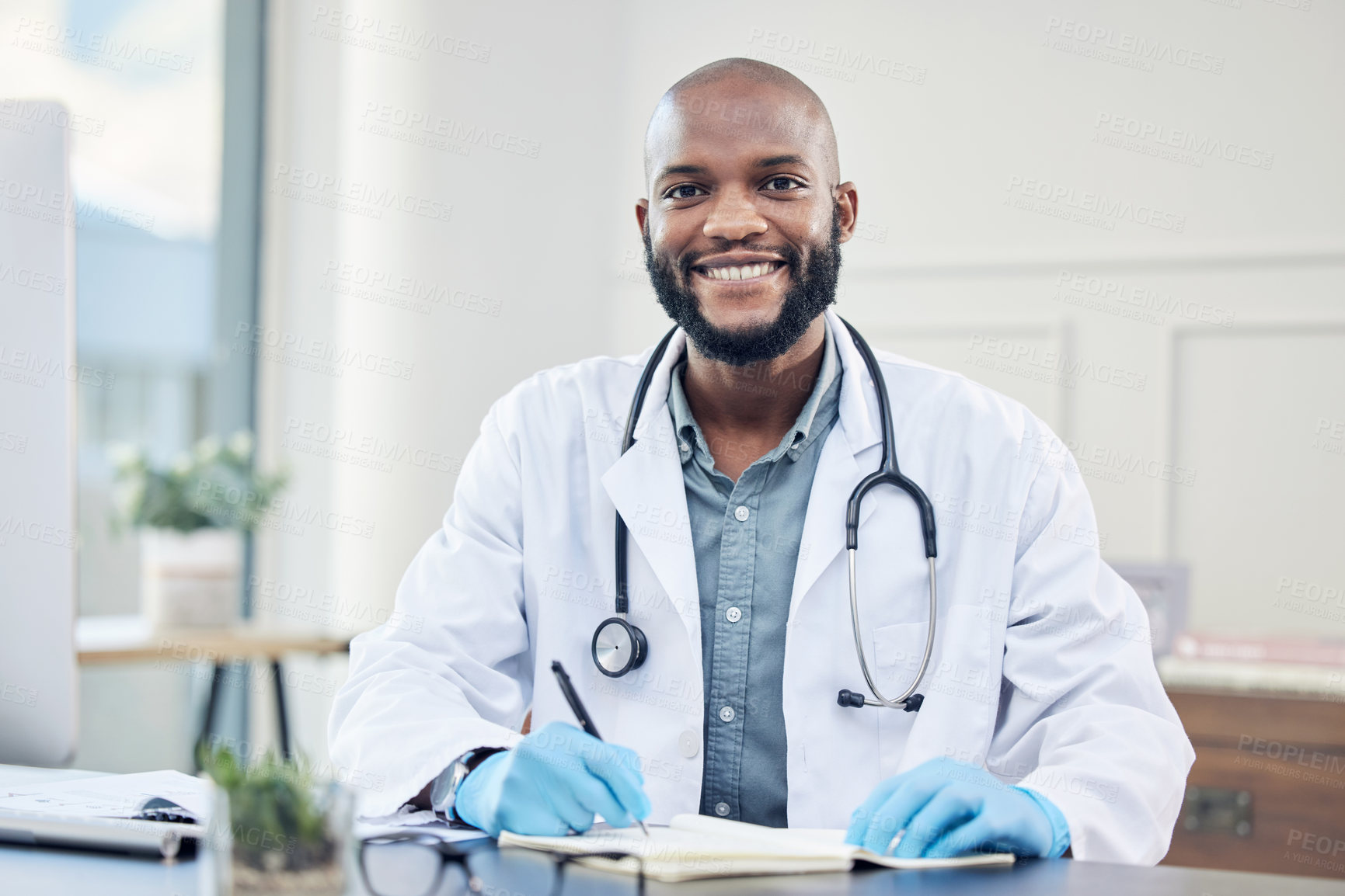 Buy stock photo Doctor, portrait and clinic with smile, writing and record for prescription in healthcare as professional. African male physician and hospital for consultation, medical and wellness with stethoscope