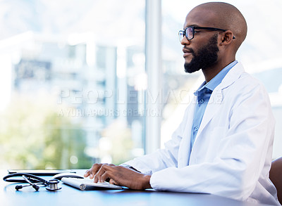 Buy stock photo Healthcare, typing or black man doctor on computer in office for research, planning or clinic schedule. Report, glasses or surgeon with hospital faq solution, online consulting or Telehealth service