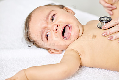 Buy stock photo Sick baby, crying and doctor hands with stethoscope for check up, healthcare and stethoscope in heart clinic. Child, female physician and hospital bed for upset kid, paediatrician and medical aid