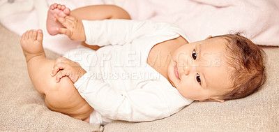 Buy stock photo Shot of a little baby playing by itself