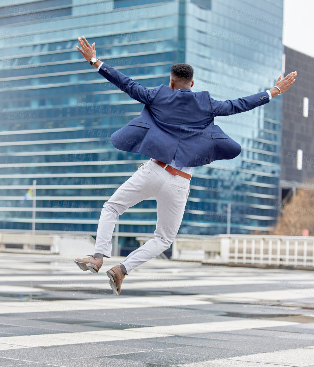 Buy stock photo Happy, jump and business man in city for celebration, success and winner. Excited, promotion and wow with male employee jumping in urban outdoors for achievement, motivation and bonus target