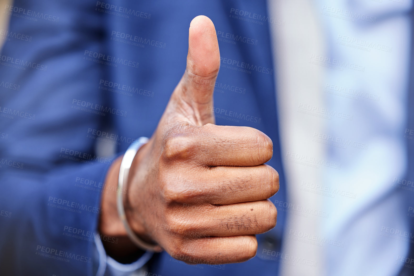 Buy stock photo Shot of an unrecognizable businessman showing thumbs up