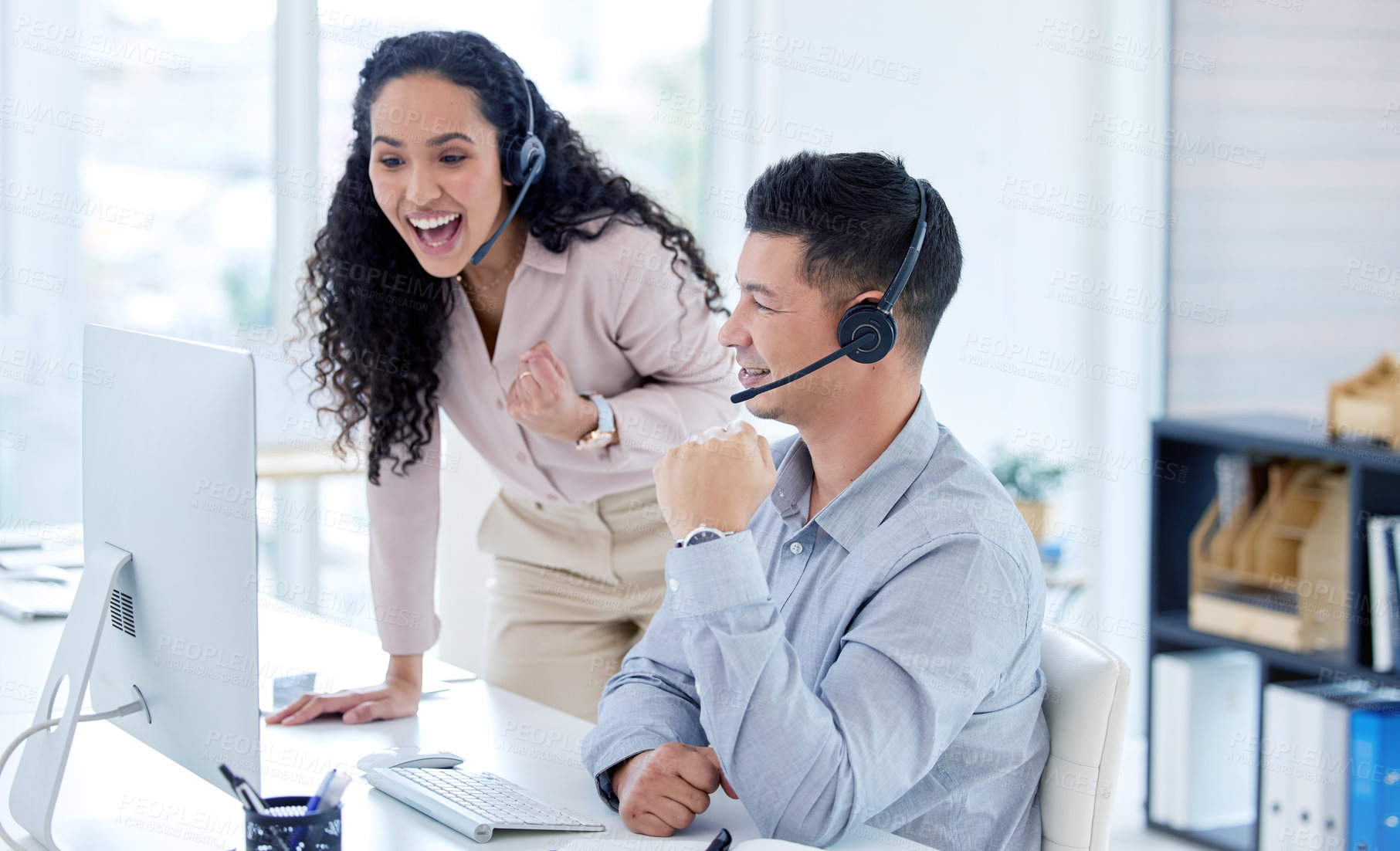 Buy stock photo Celebrate, man or woman with headset in office for career, positive review or happy call agents. Business people, teamwork or consultants for advice, support or answer questions for customer service