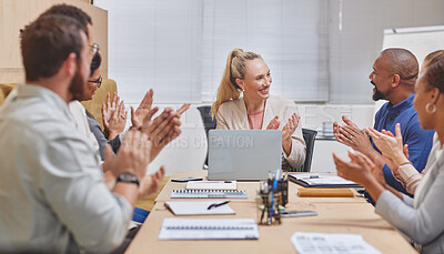 Buy stock photo Cropped shot of a group of corporate businesspeople applauding during a meeting in the boardroom