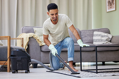 Buy stock photo Cleaning, vacuum and man in home with appliance for chores, housework or responsibility. Bacteria, furniture and smile with happy person on floor of apartment for control or hygiene in morning