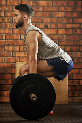 Buy stock photo Weightlifting, workout and man with barbell for deadlift exercise, bodybuilder training and fitness. Sports, strong muscles and serious male person lift weights for wellness, healthy body or strength