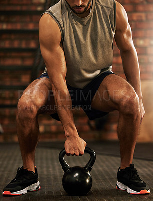 Buy stock photo Fitness, kettlebell and man doing a squat workout in the gym for strength, health and motivation. Sports, strong and closeup of a male athlete doing an arm exercise with weights in a sport center.