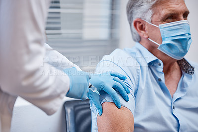 Buy stock photo Shot of a patient receiving a covid vaccination