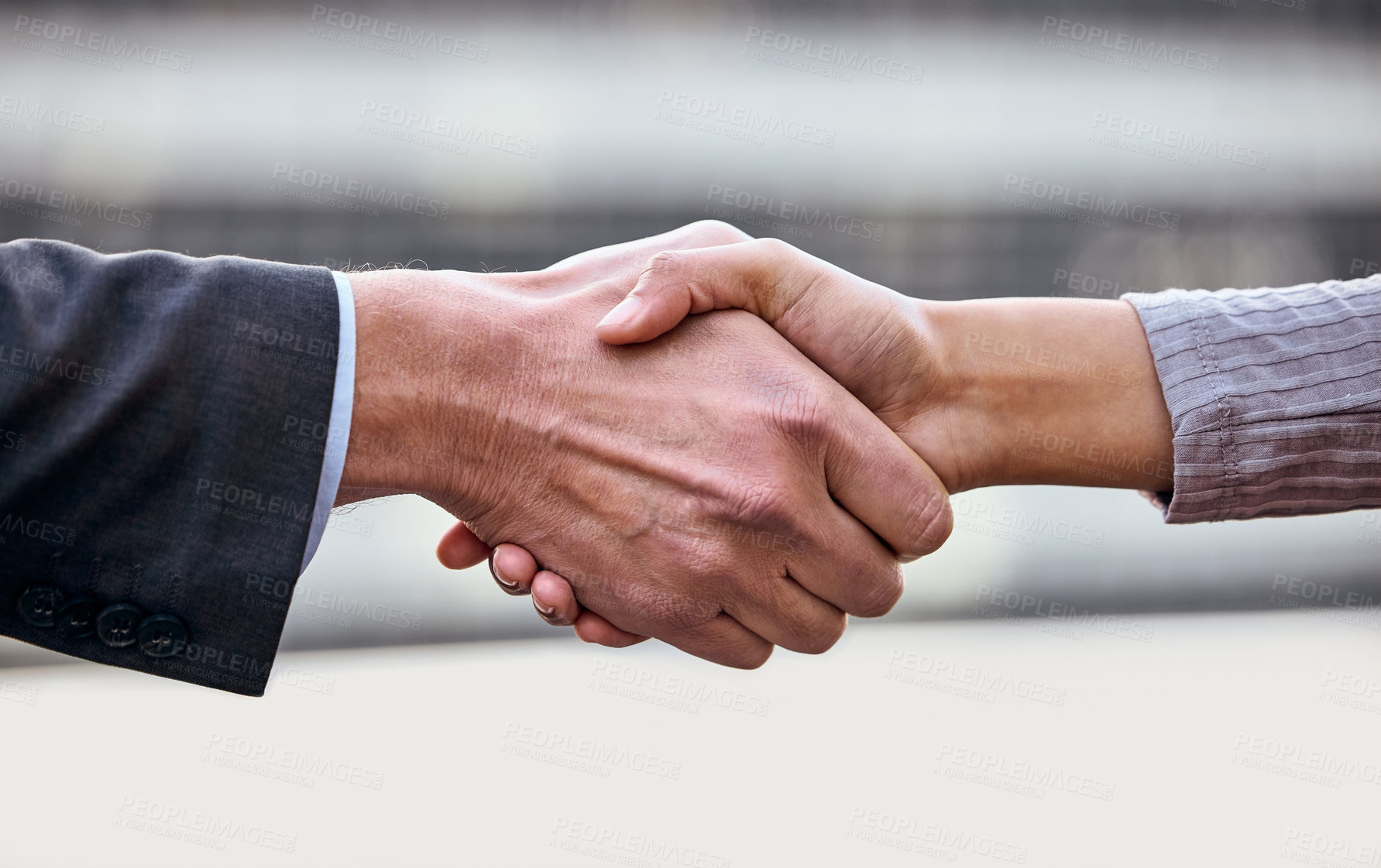 Buy stock photo Shot of a group of unrecognizable businesspeople shaking hands