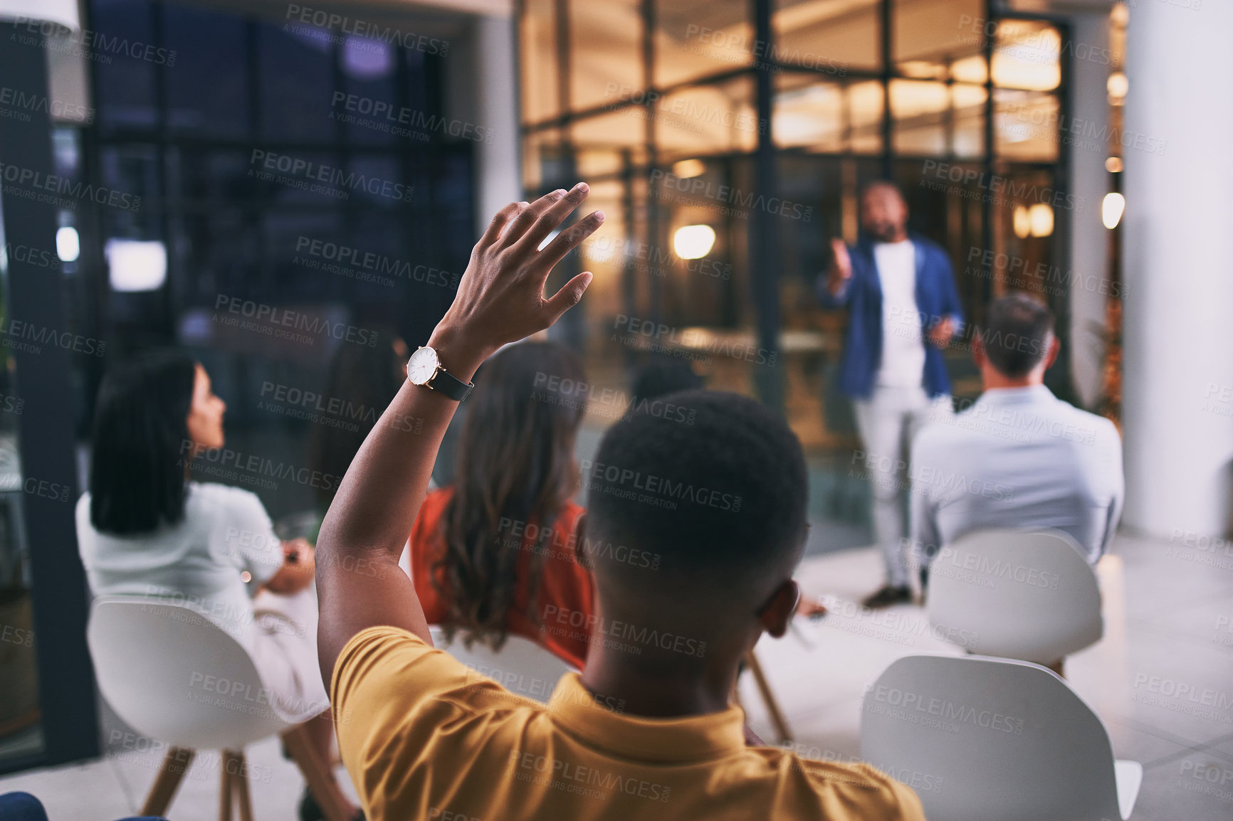 Buy stock photo Shot of an unrecognizable businessperson raising their hand to ask a question during a conference at work