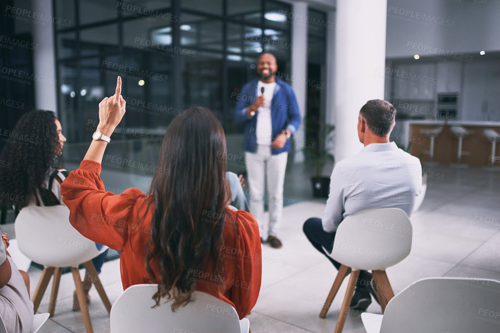 Buy stock photo Shot of an unrecognizable businessperson raising their hand to ask a question during a conference at work