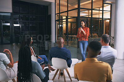 Buy stock photo Shot of a young businesswoman talking during a conference at work
