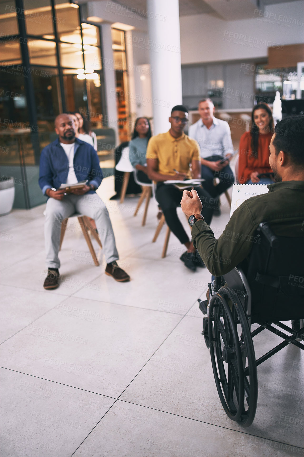 Buy stock photo Shot of a group of businesspeople attending a conference at work