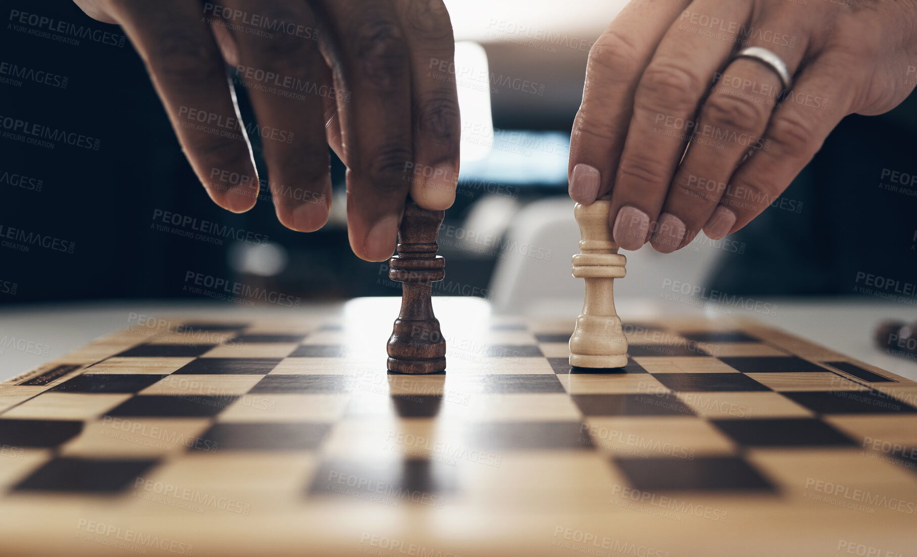 Buy stock photo People, hands and playing a chess game for competition, challenge and strategy with pawn move closeup. Couple, fun boardgame and contest with problem solving, solution and critical thinking in home