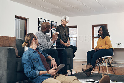 Buy stock photo Shot of a group of designers have a discussion